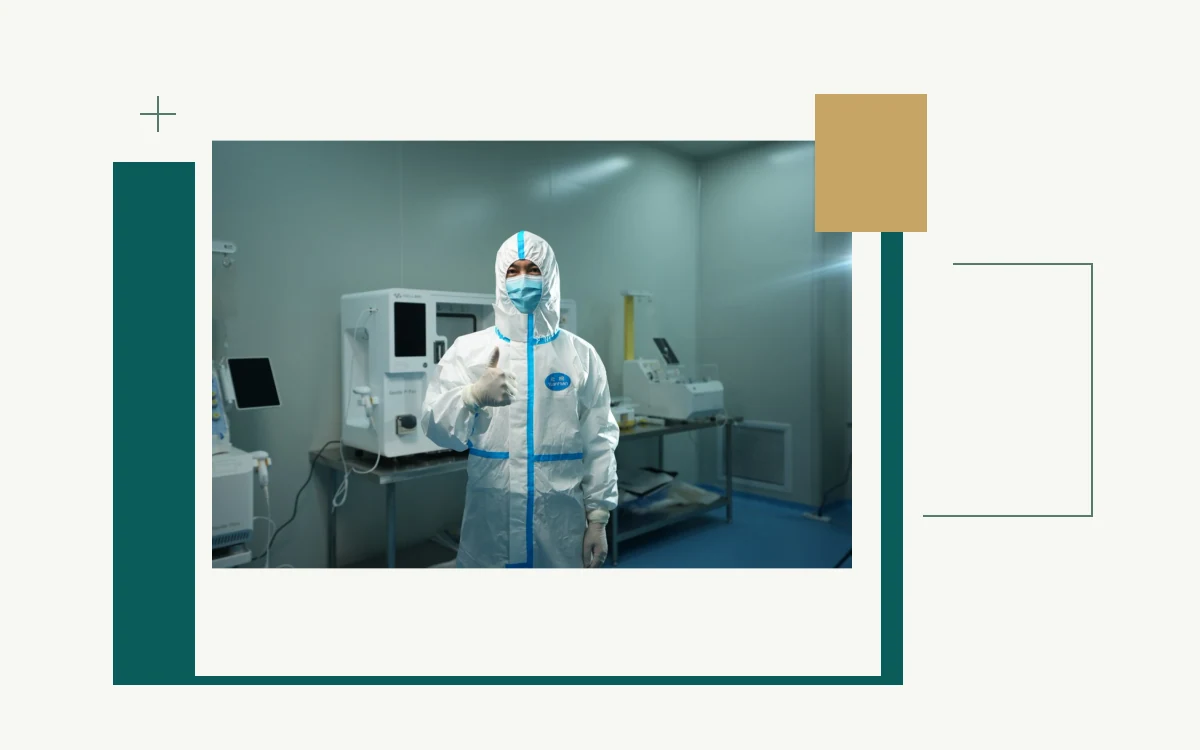 Worker in protective clothing in a West China Lecheng Hospital laboratory
